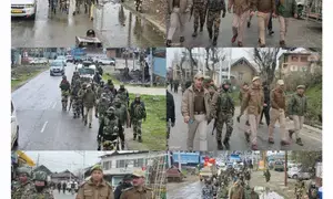 Flag March taken out in J&Ks Sopore to reassure voters of security