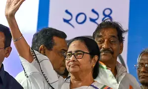 BJP moves ECI flagging distribution of copies carrying Mamatas pic in state-run schools