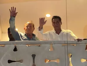 Salman, joined by father Salim Khan, greets cheering crowds outside Galaxy Apts