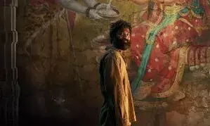 Dhanush sports disheveled look in Kubera poster