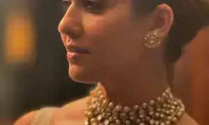 Nayanthara wows fans with her picture in striped saree, choker necklace