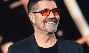 Simon Cowell finally opens up about why hes forced to wear red-tinted glasses