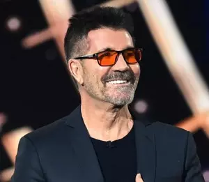 Simon Cowell finally opens up about why hes forced to wear red-tinted glasses