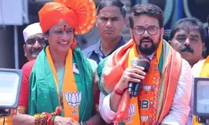 Hyderabads BJP nominee files nomination with rally from Charminar