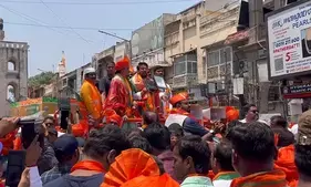 Union Minister Anurag Thakur holds roadshow in Owaisis home turf