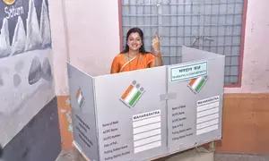 Maha MLA takes MP wife on bike ride to cast vote in Amravati
