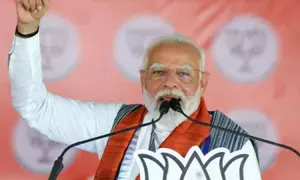 PM Modi takes opposition to cleaners on EVMs, once again