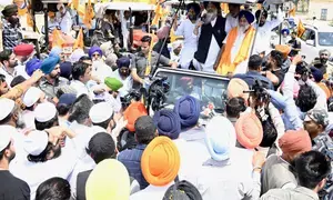 Election Commission warns Akali Dal, AAP over model code violations
