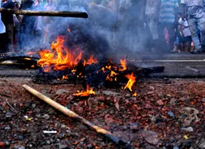 Post-poll violence in Bengal’s Murshidabad continues, shops set on fire Post-poll violence in Bengal’s Murshidabad continues, shops set on fire