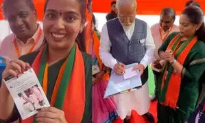 In Telangana, PM Modi gives autograph on photo of girl who sang a song on him