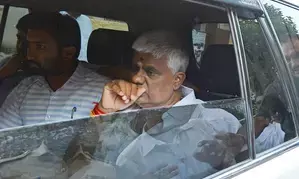 Emotional H.D. Revanna heads to father Deve Gowdas house after release from prison on bail