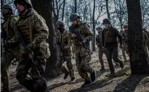 Ukraine withdraws troops from some Kharkiv positions Ukraine withdraws troops from some Kharkiv positions