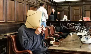 Trial of Syrian government militias head begins in Germanys Hamburg