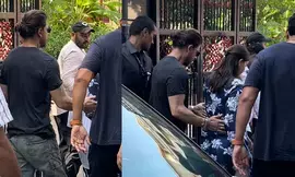 SRK practises what he preaches, exercises his right with wife Gauri, son Aryan