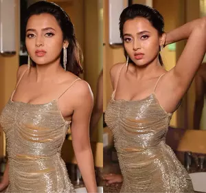 Tejasswi Prakash sizzles in golden shimmery dress, wet hair and glossy makeup