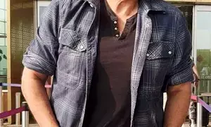 Venkatesh Daggubati aces airport look with checkered shirt and denims