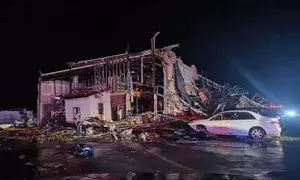 11 killed as tornadoes leave trail of death and destruction in three US states (Lead)