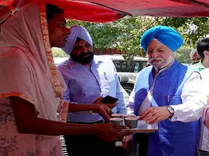 Hardeep Puri interacts with transgender tea seller in Chandigarh Hardeep Puri interacts with transgender tea seller in Chandigarh