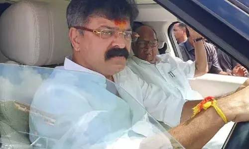 Tearing down Ambedkar’s photo: NCP, Shiv Sena demand Jitendra Awhad’s arrest