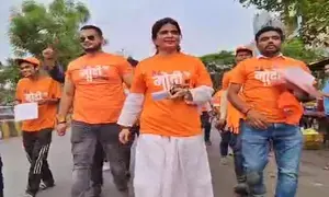 Varanasi youth wearing Main hoon Modi ka Parivar T-shirts seek support for PM Modi