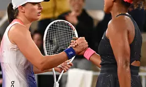 French Open: Iga Swiatek saves match point to beat Naomi Osaka