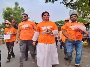 Varanasi youth wearing Main hoon Modi ka Parivar T-shirts seek support for PM Modi