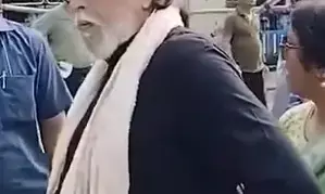 Mithun Chakraborty stands in queue to cast his vote in Kolkata