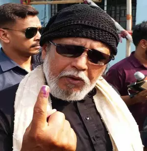 Mithun Chakraborty faces protests by TMC cadres for taking selfies with voters after casting vote Mithun Chakraborty faces protests by TMC cadres for taking selfies with voters after casting vote
