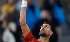 French Open: Djokovic rallies from the brink to beat Cerundolo in fourth-round classic