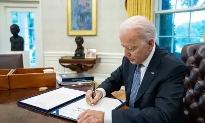 Biden signs executive order to curb unlawful border crossings by immigrants