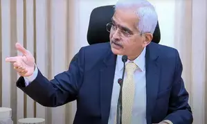 RBI Governor warns banks, NBFCs over slapping extra fees on customers