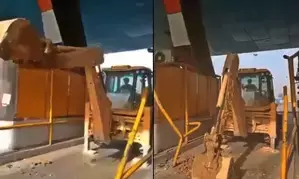 Angry JCB driver held ahter he bulldozes toll booths