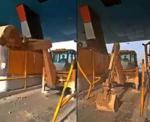 Angry JCB driver held ahter he bulldozes toll booths Angry JCB driver held ahter he bulldozes toll booths