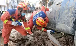 38 dead, 2 missing after heavy rains in China county