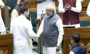 Rahul Gandhi, PM Modi shake hands as they welcome LS Speaker Om Birla