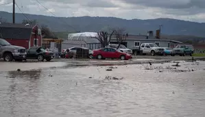 Two killed, hundreds evacuated as floods hit US Two killed, hundreds evacuated as floods hit US