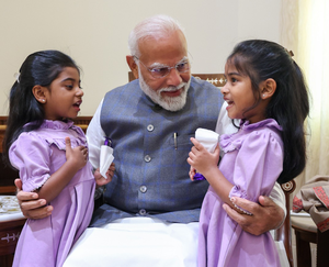 PM Modi hugs, showers praise on two special guests in Parliament