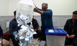 Gunmen attack ballot box convoy in Iran, killing 2 police officers