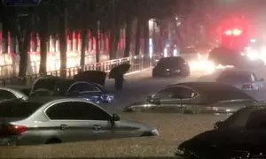 Landslides, power outages reported as heavy rain soaks South Korea