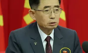 Kim Jong-uns solitary portrait pin officially seen for first time