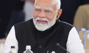 Committed to improving health infrastructure, PM Modi greets doctors