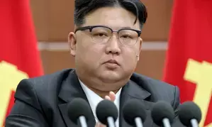 Top North Korean leader says economy shows definite upturn this year