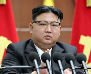 Top North Korean leader says economy shows definite upturn this year