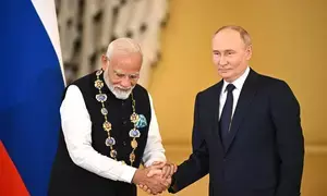 PM Modi receives Russias highest civilian award, dedicates it to people of India (Lead)
