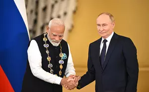 PM Modi receives Russias highest civilian award, dedicates it to people of India (Lead)