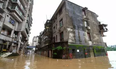 China initiates emergency response to flooding, typhoons in three regions