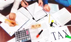 Budget heralds big bang tax reforms, simplifies long term capital gains: Experts