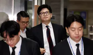 South Koreas main opposition party urges new PPP leader to cooperate in passing special probe bill on Marines death