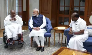 Former PM Deve Gowda, Kumaraswamy meet PM Modi