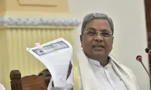 K’taka CM accuses Gowda, Kumaraswamy of misuse of power for acquiring land